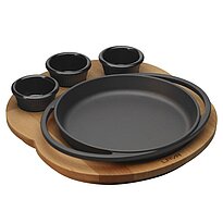 Round skillet and wooden service platter